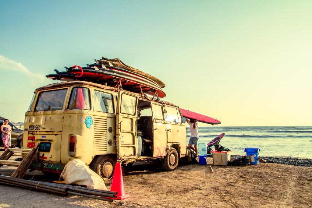 Hippie Surfboard Van on the beach color processed